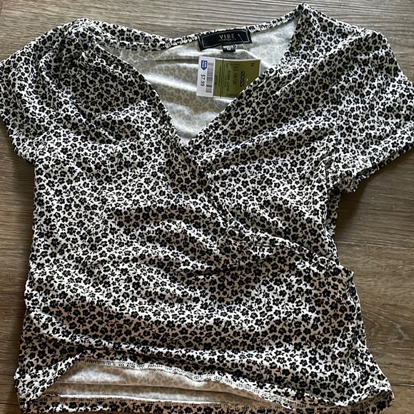 Cute soft shirt with cross in the frount. New with tags - Picture 1 of 3